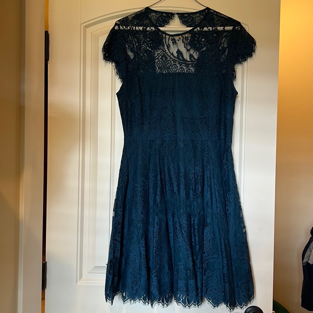 BB Dakota dress knee length turquoise in color new no tags. Lace is super soft.
